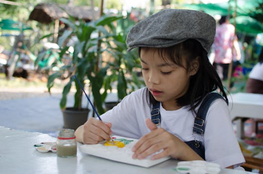 children learning to plant in a community garden